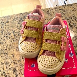 Gently worn Twinkle Toes by Skechers!